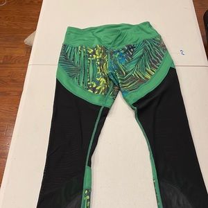 Floral and net legs. Size Small. Capri leggings